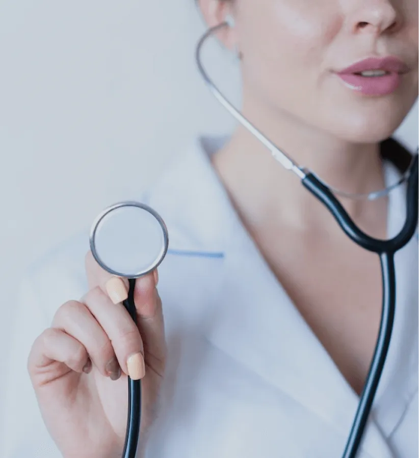 A doctor holding a stethoscope